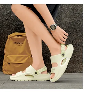 Outdoor close-up of breathable light green EVA beach sandals with adjustable heel strap