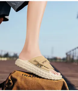 Close-up of beige sports slide with adjustable Velcro strap and thick anti-slip sole