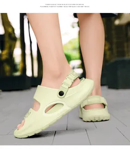Close-up of lightweight avocado green beach clogs with breathable holes and heel strap
