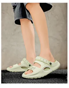 Detail of light green men's EVA sandals showing adjustable buckle and fashion design