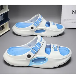 Detail of white and blue men's beach sandals with thick EVA sole and side ventilation holes