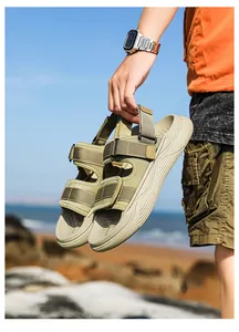 Detail of khaki outdoor men's sandals with ergonomic soft sole and anti-slip wavy tread