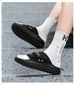 Detail of thick anti-slip sole on black platform sport slide sandals with velcro strap