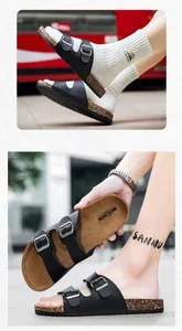 Detailweergave van zwarte kurken sandalen met dubbele band en metalen gespen
