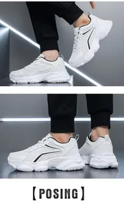 Vue détaillée de baskets blanches à semelles épaisses avec lignes noires et mesh aéré