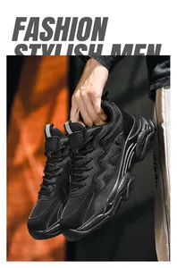 Detail of lightweight black dad sneakers with mesh texture and shock-absorbing sole