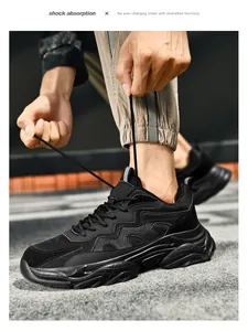 Detail shot of black lightweight shock absorption sneakers with mesh fabric and thick soles