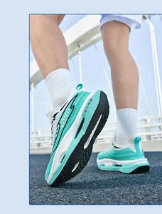 Close-up of the hollowed-out shock-absorbing midsole on a blue and white running shoe