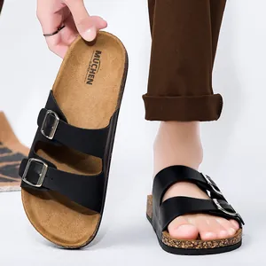 Klassieke zwarte kurken slippers met dubbele verstelbare gespen en mat leren bandjes
