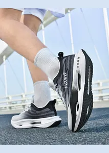 Close-up action shot of carbon fiber running shoes with breathable mesh and gradient design