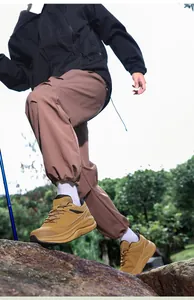 Outdoor brown leather casual sports shoes with cushioned thick sole for hiking and trekking