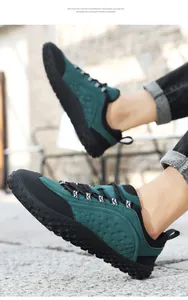Detail of lightweight green hiking shoes with EVA soles and breathable mesh upper