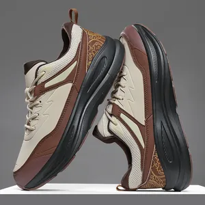 Retro chunky sneakers in earth tones with cushioned sole and vintage pattern detail