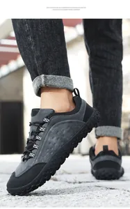 Detail of dark grey outdoor barefoot shoes featuring lightweight EVA foam soles and non-slip treads