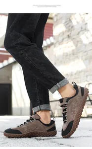 Close-up of brown suede outdoor hiking shoes with EVA lightweight sole on city street