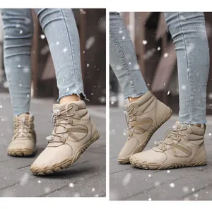 Detail of beige winter barefoot boots with anti-slip rubber sole and warm lining