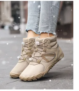 Winter outdoor boots with warm fleece lining and quick-lace toggle on khaki fabric