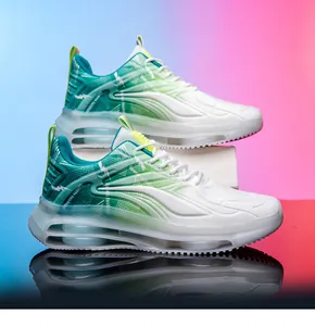 Detail of gradient white to green sports shoe with double air cushion and chunky sole