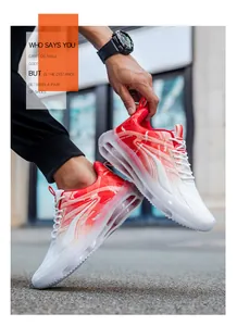 Detail of red and white gradient men's running shoes with transparent air cushion sole