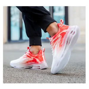Detail of red and white sports shoes featuring thick transparent cushioned soles on feet