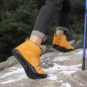 Waterproof outdoor hiking boots in mustard yellow with non-slip soles for men and women