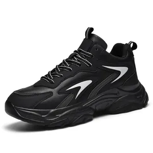 Men's chunky black sports sneakers with thick shock-absorbing sole and silver geometric pattern