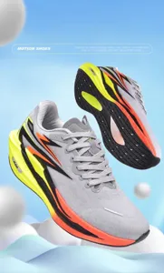 Detail of lightweight running shoe sole with shock-absorbing texture and vibrant accents