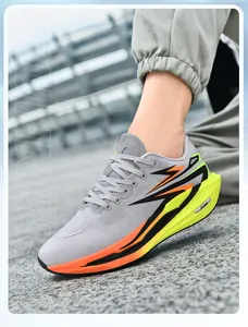 Close-up of breathable mesh running shoe with orange dynamic stripes and thick foam sole
