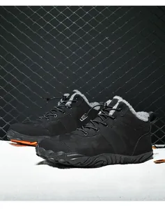 Detail of waterproof outdoor winter boots with thick fleece lining and non-slip rubber sole
