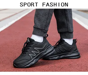 Outdoor black athletic walking shoe with drawstring laces and shock-absorbing rubber sole