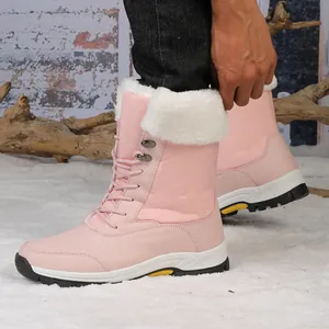 Botas de nieve rosas con cuero acolchado, cuello de piel y suela gruesa de caucho