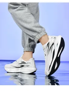 Detailed side view of white mesh running shoes with cushioning sole and silver accents