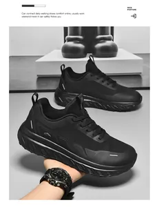 Detail of lightweight black mesh running shoe with thick non-slip sole and side logo