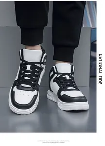 Detail of high-top black and white sneakers featuring lightweight EVA foam soles and leather upper