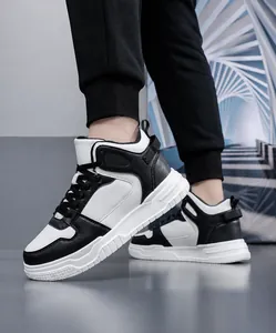 On-foot shot of black and white high-top platform sneakers with durable rubber soles