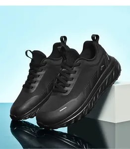 Detail of black mesh breathable running shoe with cushioned sole and running logo