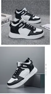 Close-up of high-top black and white leather sneakers with thick non-slip soles