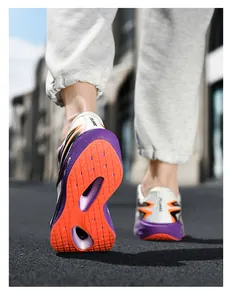 Macro detail of high-performance running shoe outsole with FLAME lettering and traction
