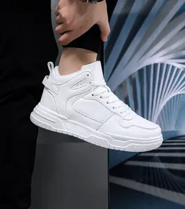 On-foot shot of white high-top leather sneakers featuring JGAK side embossed logo details