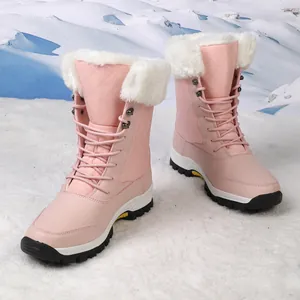 Botas de nieve rosa con forro de piel sintética y suela de goma antideslizante en nieve