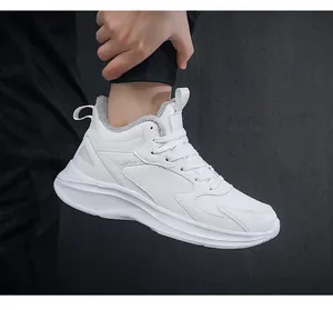 Detail showing the thick grey faux fur lining for warmth in winter athletic shoes