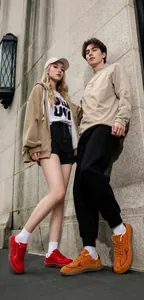 Detail of trendy retro sneakers featuring soft uppers and comfortable fit in outdoor setting