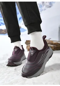 Deep purple winter walking shoes with fleece lining shown on-foot in a snowy outdoor scene