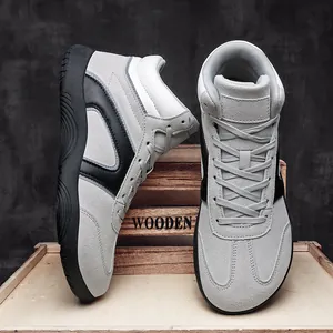 Retro high-top walking sneakers in gray and black suede with thick rubber soles