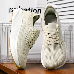 Baskets Homme Décontractées Bout Large Respirantes en Maille Flyknit Chaussures de Course Marche Légères Antidérapantes de Sport
