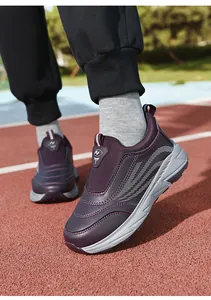 Detail of purple winter walking shoes with thermal plush lining and thick anti-slip soles