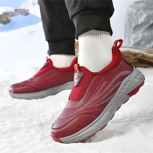 Red winter outdoor casual shoes with warm fleece lining and thick rubber sole in the snow