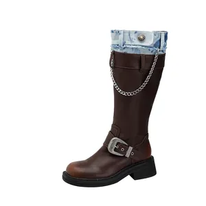 Vintage brown tall boots with denim splicing and metal chains on platform rubber soles