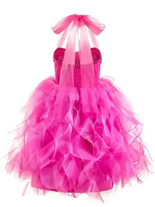 Rear view of pink flower girl dress featuring a large bow and layered tulle skirt
