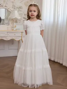 Elegant white lace floor-length flower girl dress with puff sleeves and mesh polka dots